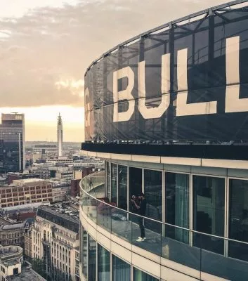 A shot of Staying Cool's Rotunda Penthouse balcony and the city views beyond taken from a drone by local photographer @birminghman