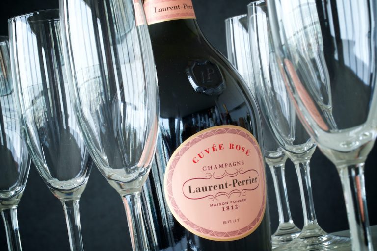 Bottle of Laurent Perrier Cuvee Rose champagne with glasses - 72px