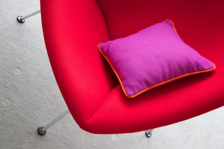Red Oyster Chair with purple cushion at Staying Cool