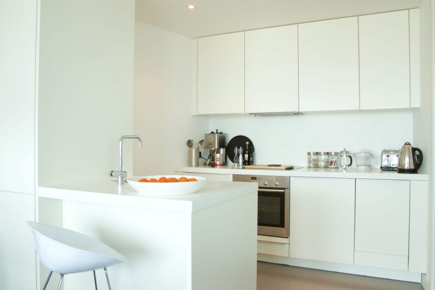 White Poggenpohl kitchen at Staying Cool's family friendly serviced apartments Birmingham