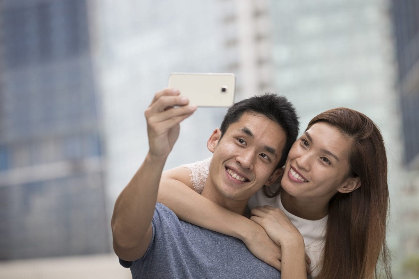 Chinese couple taking a selfie