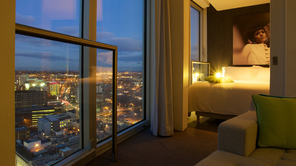 Rotunda serviced apartments view at night from lounge onto cityscape and bedroom