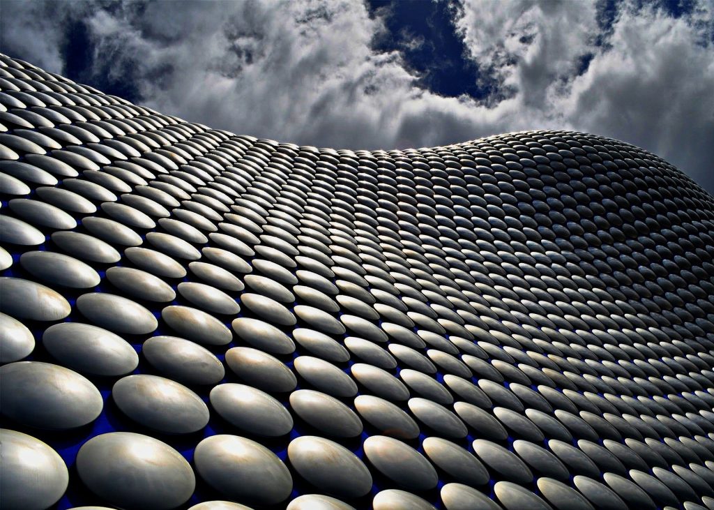 Exterior of Selfridges Birmingham showing curve of building and some of the 15,000 aluminium disks that clad the building.