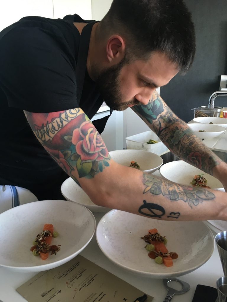 Chef-Alex-Claridge-plating-up-food-for-dining-event-at-staying-cool-at-Rotunda-72px