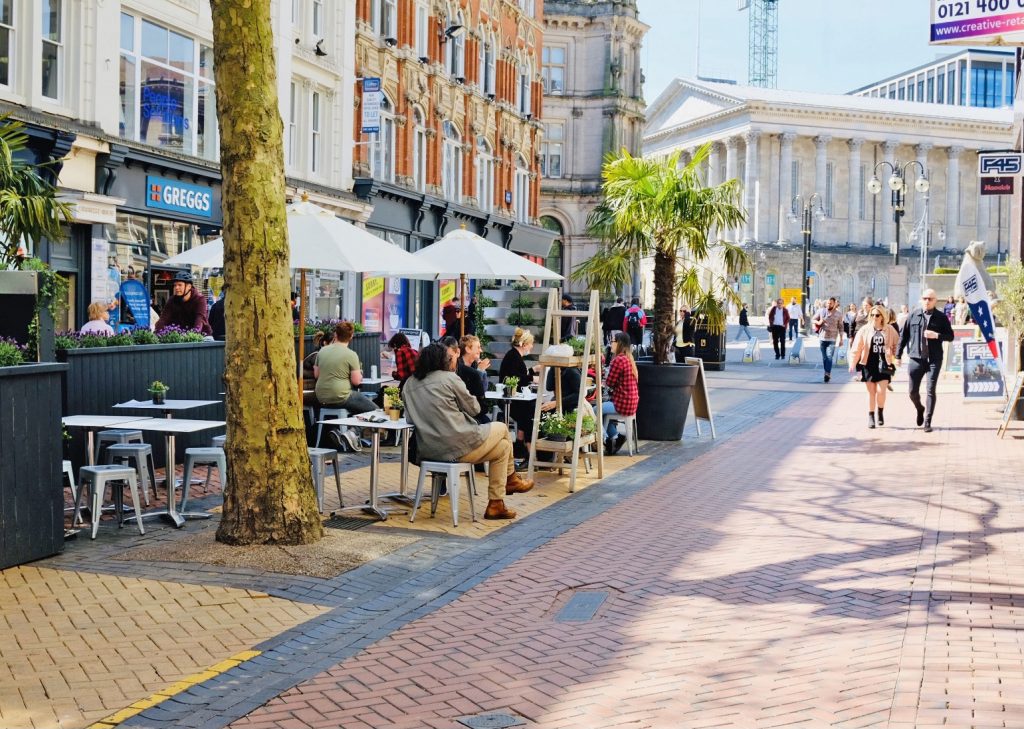 An image of Medicine Bakery's outdoor dining space in the sunshine on New Street in Birmingham. A short walk from Staying Cool's Rotunda serviced apartments.