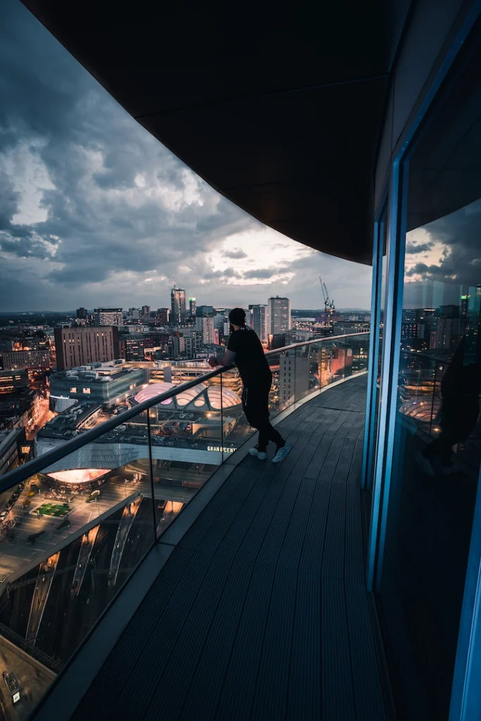 Local photographer Jag Dhesi taking in the city views from Staying Cool's rotunda penthouse balcony. Credit: Jag_dhesi