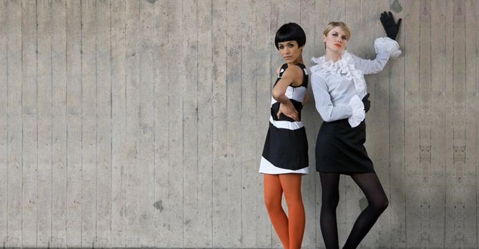Staying Cool models in front of one of Birmingham's brutalist concrete structures.