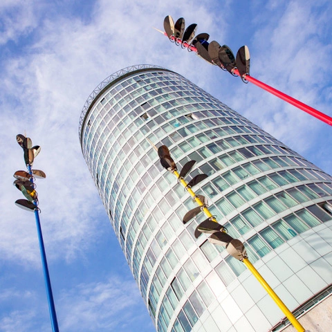 Looking up at Staying Cool's Rotunda apart hotel from the pedestrianised Rotunda square outside the Bullring shopping centre