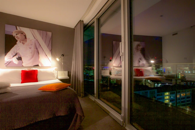 Snap a pic of the city lights and beyond from the comfort of your Staying Cool kingsize bed