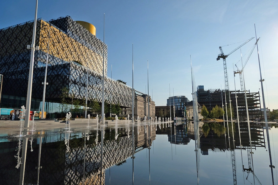 The library of Birmingham situated in the heart of Centenary Square under beautiful blue skies. The perfect place to wander on a family trip.