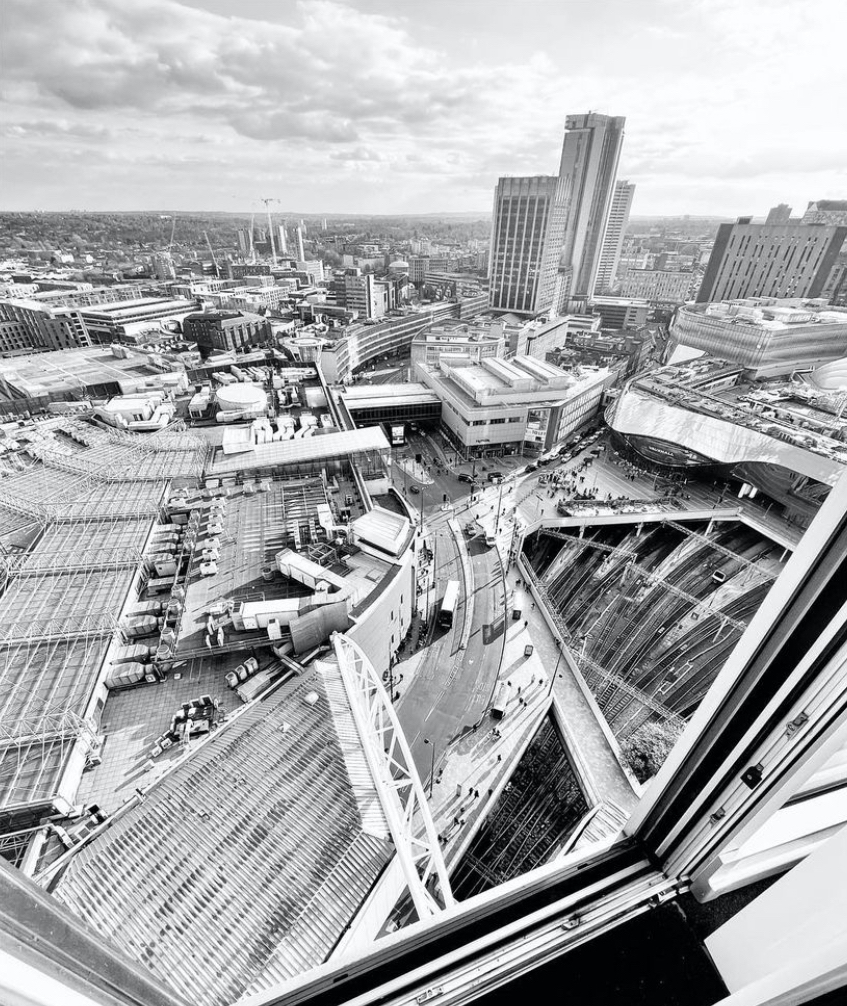 Views of bullring and new street station from Staying Cool's Rotunda apart hotel in black and white taken by @maggiemcatamney